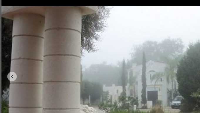The Hacienda House exterior in morning mist